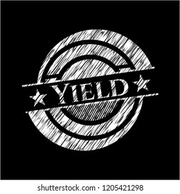 Yield written with chalkboard texture