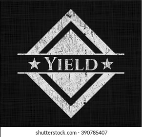 Yield written on a blackboard