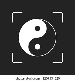 yin yan symbol. White object in camera autofocus on dark background