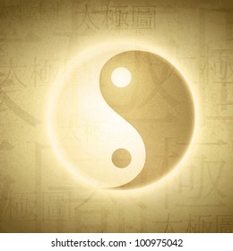 Yin Yang symbol with writing on Chinese "Taijitu" (English translating "diagram of ultimate power"- term which mean yin and yang) at grunge background