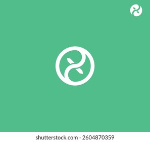 Ying Yang Letter X or  X leaf nature logo design with green background. 