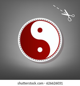 Ying yang symbol of harmony and balance. Vector. Red icon with for applique from paper with shadow on gray background with scissors.