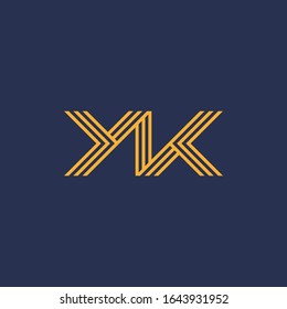 YK monogram logo with stripes accent.