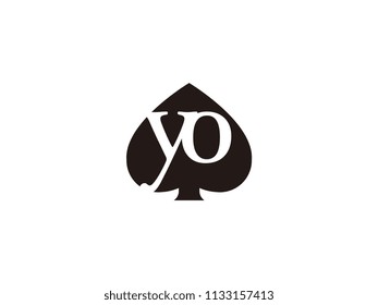 The yo initials logo inside the black shovel
