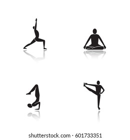 Yoga asanas drop shadow black icons set. Virabhadrasana, siddhasana, vrishchikasana, utthita hasta padangusthasana yoga positions. Isolated vector illustrations