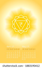 Yoga calendar. April and May 2021. Manipura icon. English calender template.  Planning grid. Creative design. The third sun chakra. Vector yellow gloss and shine. Sacral sign. Meditation