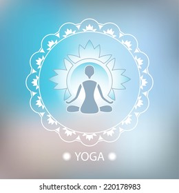 Yoga lotus pose decorative emblem background blurred