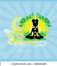Yoga lotus pose. Padmasana with colored chakra points. 