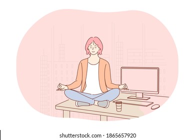 Yoga, meditation, healthy active lifestyle concept. Young smiling woman worker sitting in lotus position on table in office, practicing yoga, relaxing and meditating on workplace with eyes closed