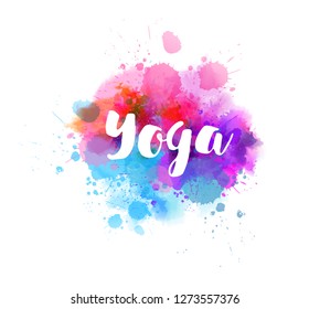 Yoga - modern calligraphy text on watercolor paint splash.