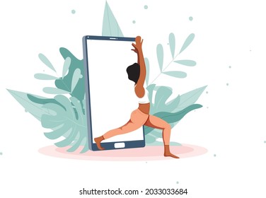 Yoga online with girl in asana doing physical exercises and watching online classes on Phone display