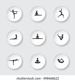 Yoga pose silhouettes on white button : Vector