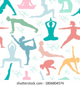 Yoga poses seamless pattern. Silhouettes of women in pastel colors.