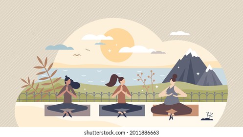 Yoga retreat and meditation group practice for body and mind wellness tiny person concept. Relaxation, breathing exercise, concentration and mindful balance together in sunset vector illustration.