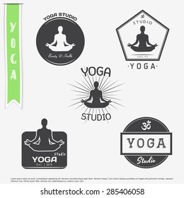 Yoga studio, fitness and meditation class. Set of typographic labels, stickers, logos and badges. Flat vector illustration