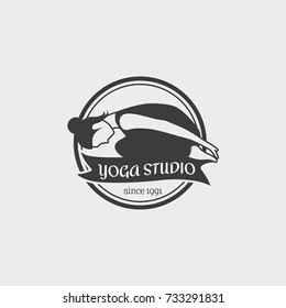 Yoga Studio Logo. Design badge template with girl practicing yoga. This monochrome symbol can be used for social network and web advertising or brand promotion.