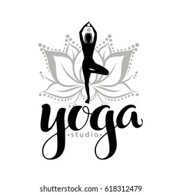 Yoga studio logo, used modern hand drawn lettering and decorative  lotuse and figure element