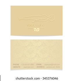 Yoga themed business card template - gold silk print of front and back sides - woman silhouette in yoga pose, lotus and paisley ornament with copy space