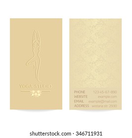 Yoga themed vertical business card template - gold silk print of front and back sides - woman silhouette in yoga pose, lotus and paisley ornament with copy space