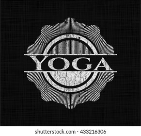 Yoga written on a chalkboard