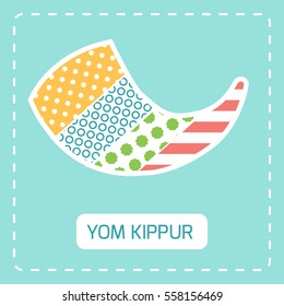 Yom kippur symbol shofar made from different pattern fabric pieces.