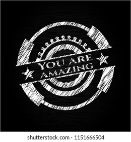  You are Amazing chalk emblem written on a blackboard