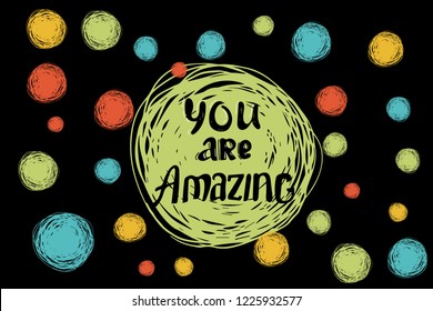 You are amazing. Hand drawing ink lettering vector art, modern calligraphy motivational poster on a creative vector background. Hand lettering quote.black background yellow red green doodle circle