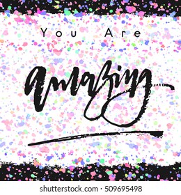 You are amazing ink calligraphy text inscription art lettering words. Spray colorful background