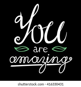 You are amazing lettering vector card with green leaves on black background.