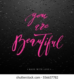 You are beautiful card. Hand drawn pink lettering background. Ink illustration. Modern brush calligraphy.
Isolated on dark background. Compliment for women. Vector illustration stock vector.
