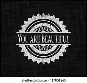 You are Beautiful chalk emblem written on a blackboard