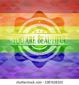 You are Beautiful emblem on mosaic background with the colors of the LGBT flag