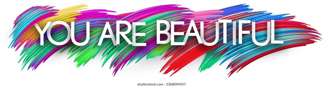 You are beautiful paper word sign with colorful spectrum paint brush strokes over white. Vector illustration.