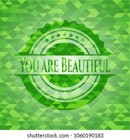 You are Beautiful realistic green emblem. Mosaic background