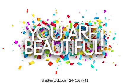 You are beautiful sign on colorful cut ribbon confetti background. Vector illustration.