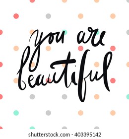 You are beautiful..Modern calligraphic style. Hand lettering and custom typography for your design. Polka dot pattern.