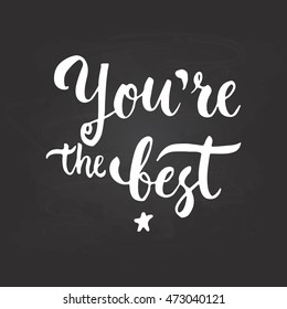 You are the Best - hand drawn lettering phrase, isolated on the black chalkboard background. Fun brush ink text inscription for photo overlays, typography greeting card or print, flyer, poster design.