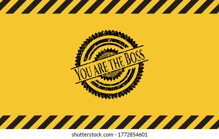 You are the Boss black grunge emblem with yellow background. Vector Illustration. Detailed. 