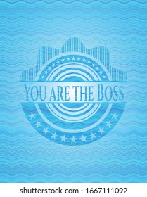 You are the Boss light blue water wave style emblem. Vector Illustration. Detailed.