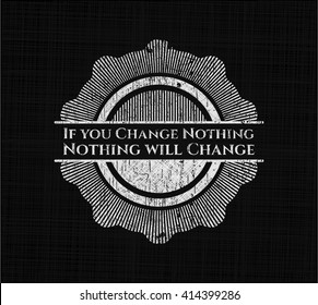 If you Change Nothing Nothing will Change chalkboard emblem written on a blackboard