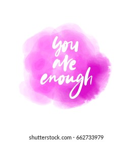 You are enough. letters on pink sea watercolor background. Modern hand drawn lettering. Hand-painted inscription. Motivational calligraphy poster. Stylish font typography. Quote for cards, invitations