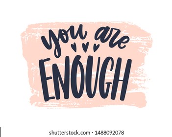 You Are Enough phrase handwritten with stylish cursive calligraphic font or script on paint trace. Elegant artistic lettering isolated on white background. Vector illustration for 14 February.
