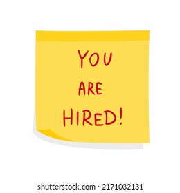 You are hired message. Career and employment concept. Yellow sticky note message. Paper sign.