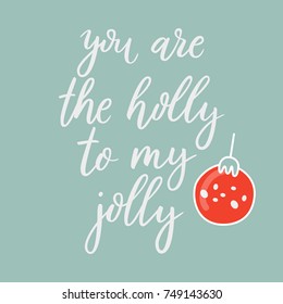 You are the holly to my jolly. Vector text for design greeting cards, photo overlays, prints, posters. Hand drawn letters. Funny saying for Christmas cards, black brush calligraphy. Christmas tree toy