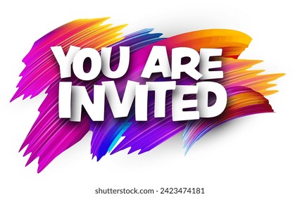 You are invited paper word sign with colorful spectrum paint brush strokes over white. Vector illustration.