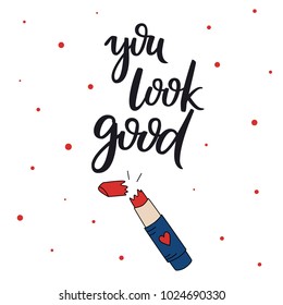 You look good. Text design. Vector calligraphy. Typography poster. Usable as background. Lipstick hand drawn vector illustration.