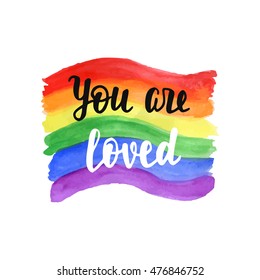 "You are loved" badge. Inspirational Gay Pride poster with watercolor rainbow spectrum flag, brush lettering. Homosexuality emblem. LGBT rights concept.