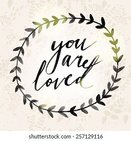 You are loved concept background for charming designs. Awesome wreath made in watercolor technique