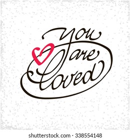 You are loved lettering handmade vector calligraphy. Simple stylish text design template on bright background. Hand drawn typography poster.