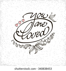 You are loved lettering handmade vector calligraphy. Simple stylish text design template on white background. Hand drawn typography poster.